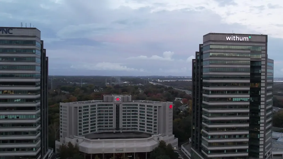 Office towers above a multilevel parking structure